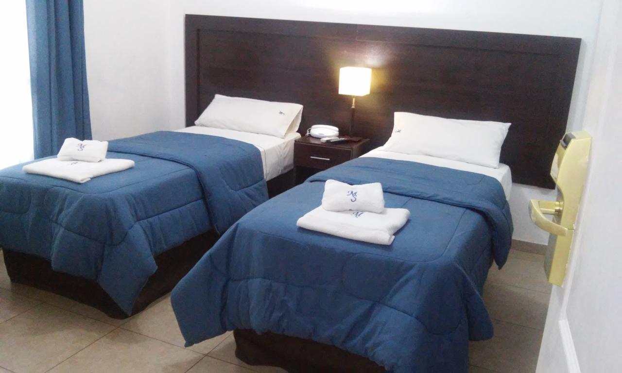 Morada Suites Campana Luaran gambar